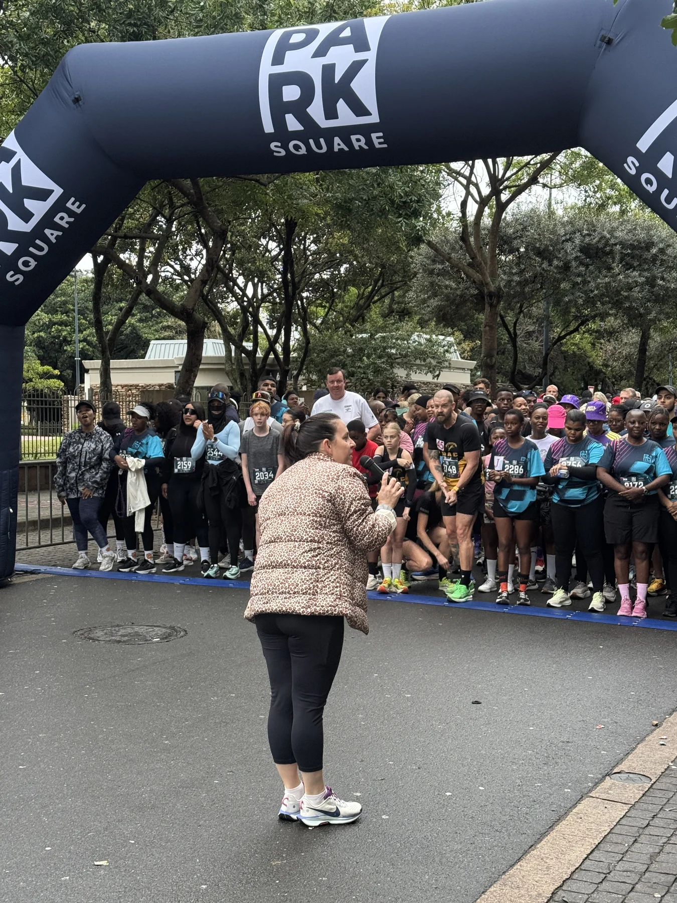 Runners gathered beneath the Park Square arch before the 5 km event