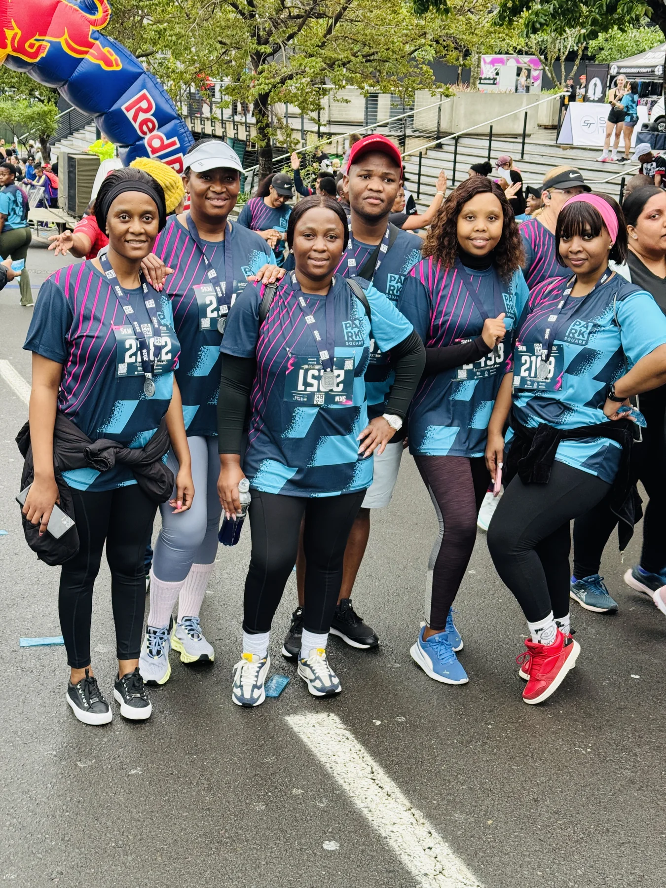 Esihlentu team members together after completing the Park Square 5K Run