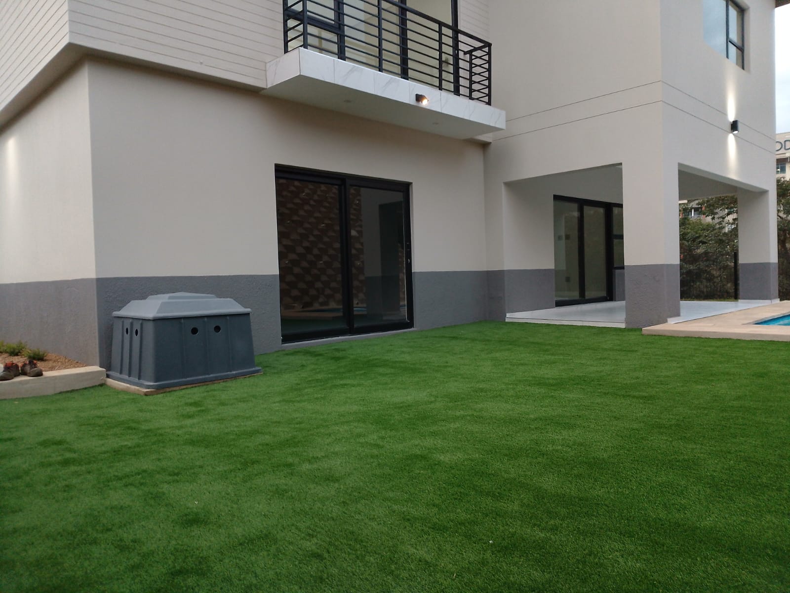 Completed courtyard and garden outside the property